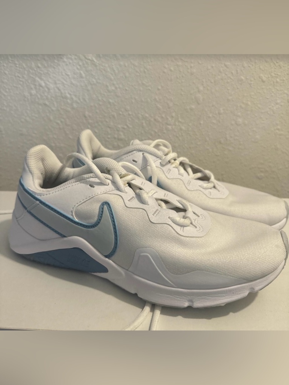 Nike Women's Legend Essential 2 Sneaker; size 8